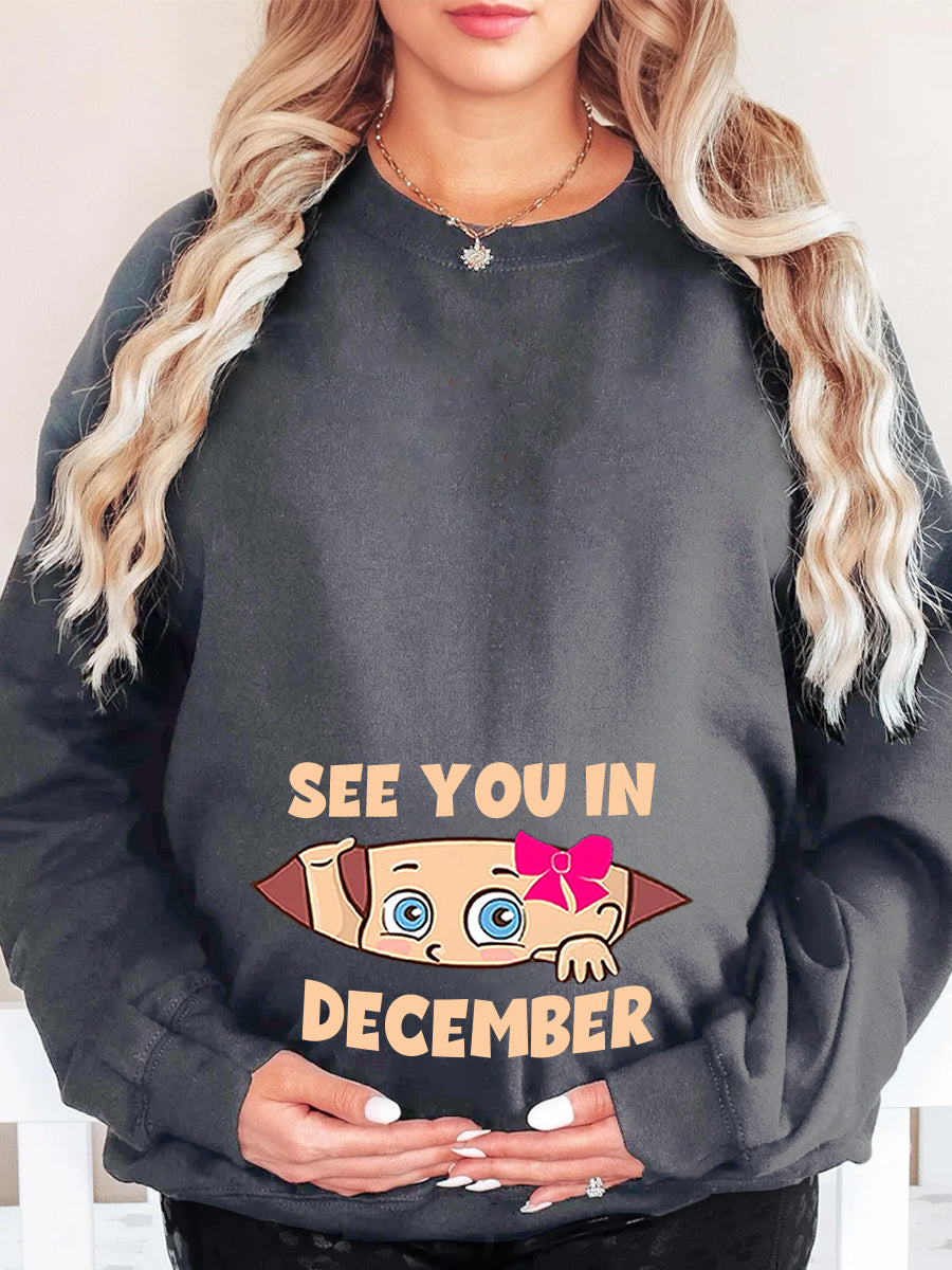 See You In Customizable Month Baby Girl Peeking Maternity Shirt